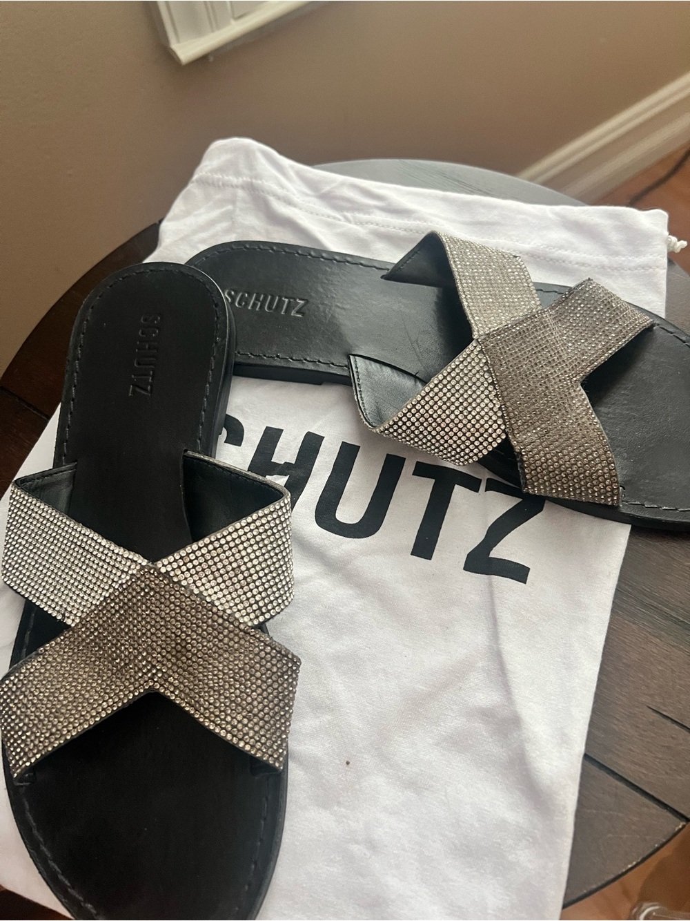 SCHUTZ Black Slide Sandals with Metallic Crystal Cross Straps